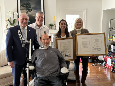 Steve Scalise presents Steve Gleason with signed legislation 