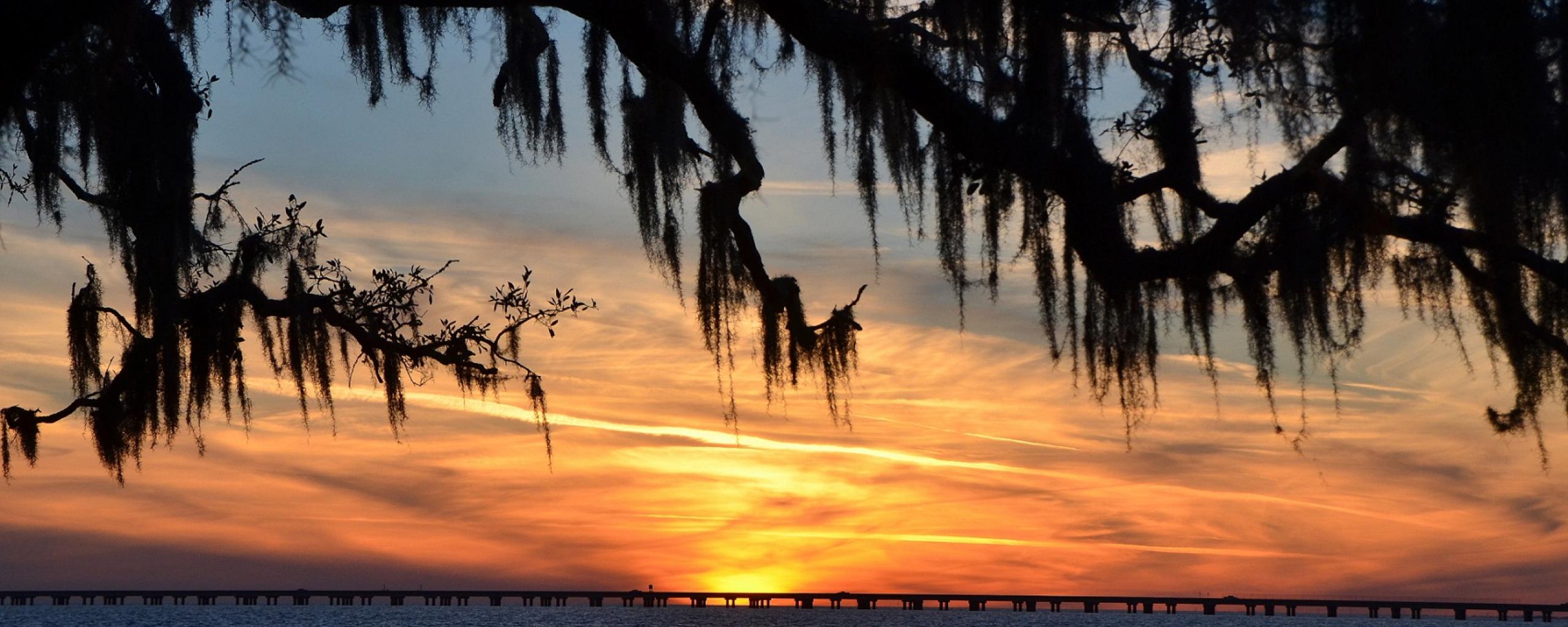 sunset over  water